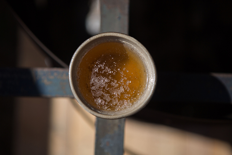 process detail of Yasmin Smith, Drowned River Valley, 2018 showing solar evaporated salt sourced from Sydney Harbour salt glaze and Barangaroo sandstone clay on salt furnace