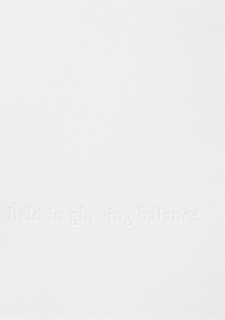 held in glowing balance
